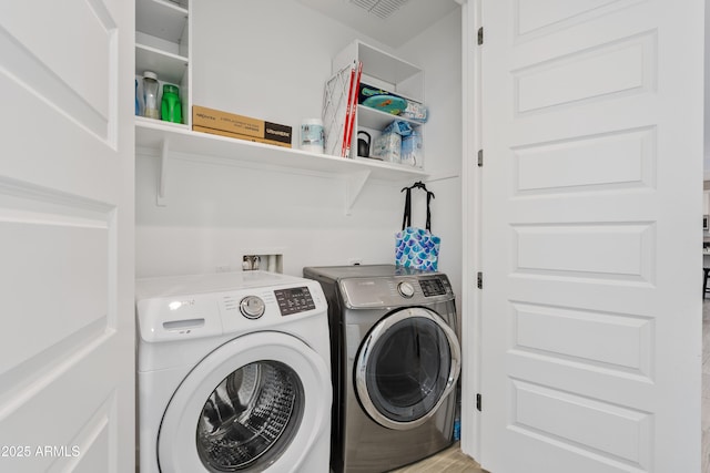 2204 E Kelly Dr, Gilbert, AZ 85298 - laundry room featuring independent washer and dryer and laundry area
