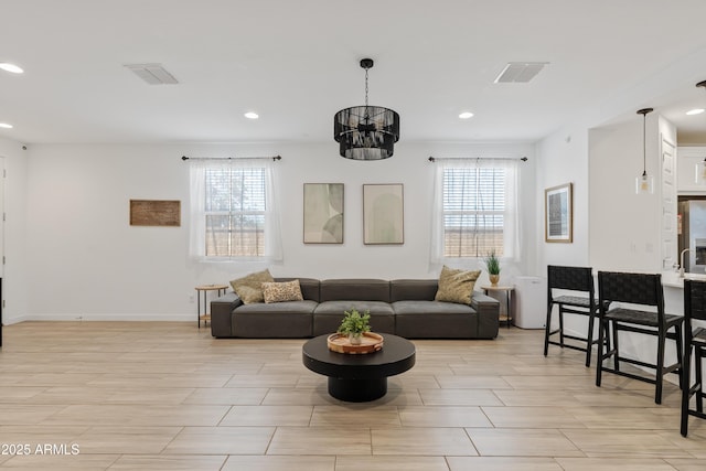 2204 E Kelly Dr, Gilbert, AZ 85298 - living room with plenty of natural light, visible vents, and recessed lighting