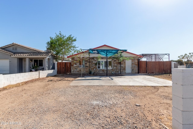 ranch-style house featuring a garage