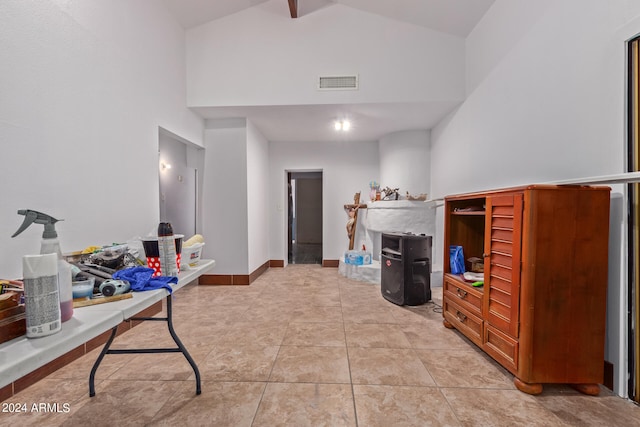 interior space featuring high vaulted ceiling