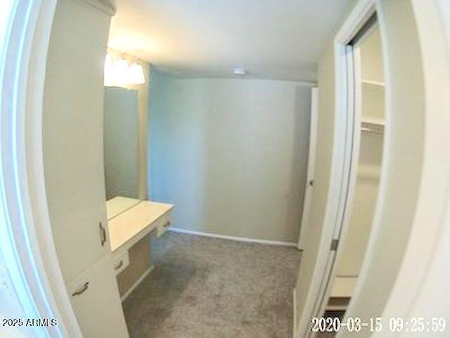 14409 N Mcphee Dr, Sun City, AZ 85351 - mudroom with carpet floors and baseboards