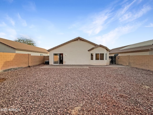 rear view of house featuring a patio