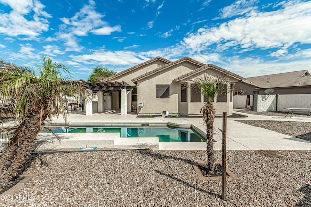 view of pool with a pergola and a patio area