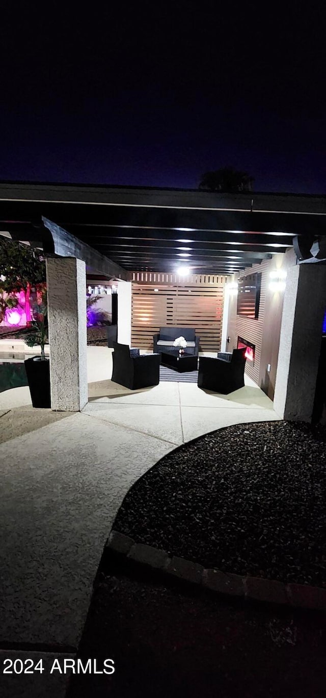 patio at night with an outdoor living space