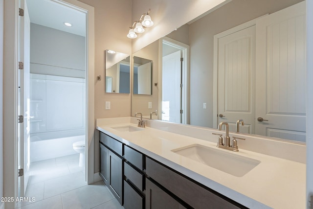 full bathroom with vanity, tile patterned floors, toilet, and bathtub / shower combination