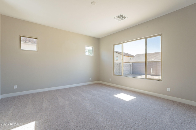 unfurnished room with carpet floors