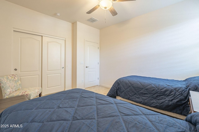 bedroom featuring a closet and ceiling fan