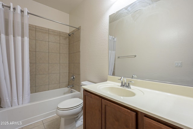 full bathroom featuring shower / bath combo with shower curtain, toilet, tile patterned floors, and vanity