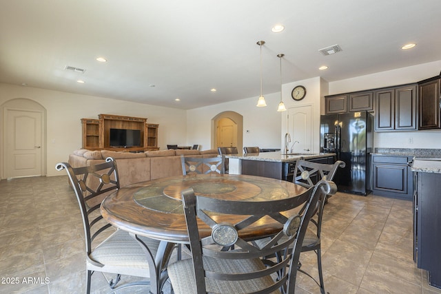 dining space with sink