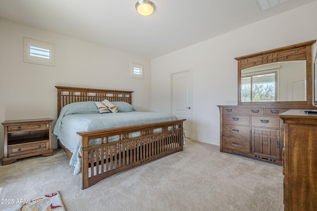 bedroom with light carpet