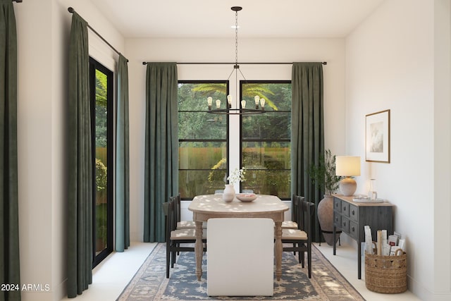 dining area with an inviting chandelier and plenty of natural light