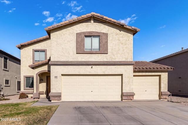 mediterranean / spanish-style home featuring a garage