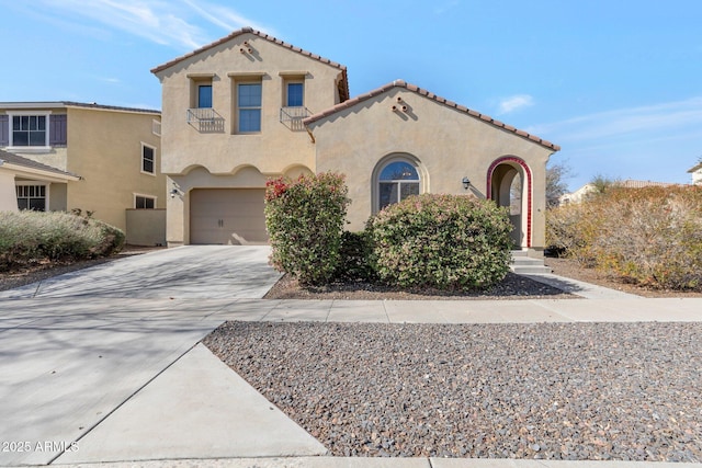 mediterranean / spanish-style house featuring a garage