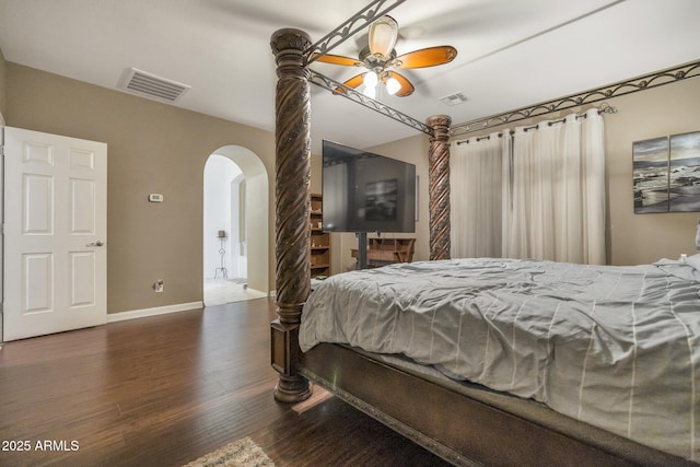 bedroom featuring dark hardwood / wood-style flooring and ceiling fan