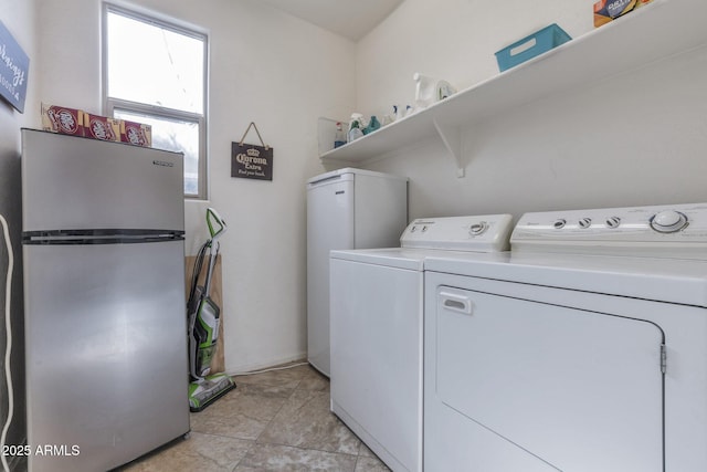 laundry area with washer and clothes dryer