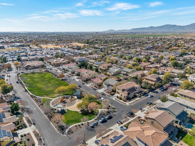 birds eye view of property featuring a mountain view