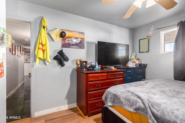 bedroom featuring ceiling fan and light wood-type flooring