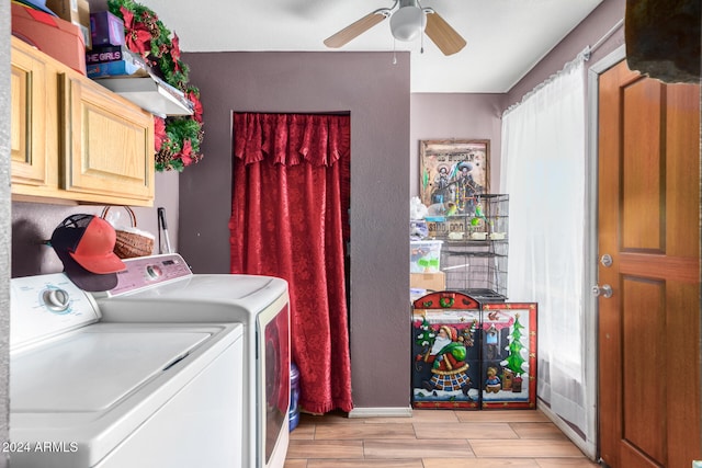 laundry room featuring cabinets, light hardwood / wood-style flooring, washing machine and clothes dryer, and ceiling fan