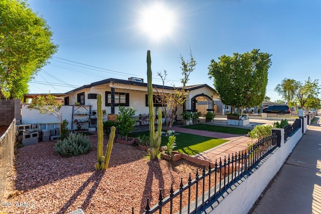 ranch-style house with a patio area