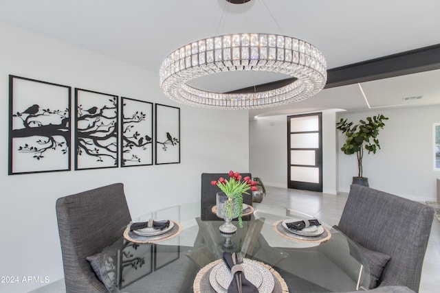 dining room featuring a chandelier