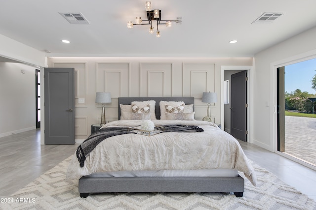 tiled bedroom featuring access to outside