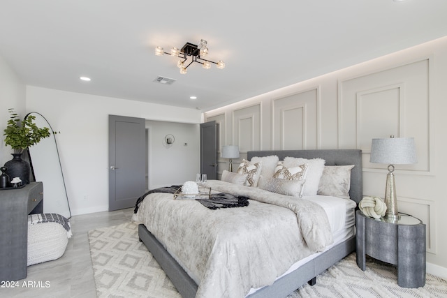 bedroom featuring light hardwood / wood-style floors