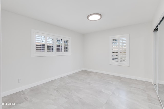 view of tiled spare room