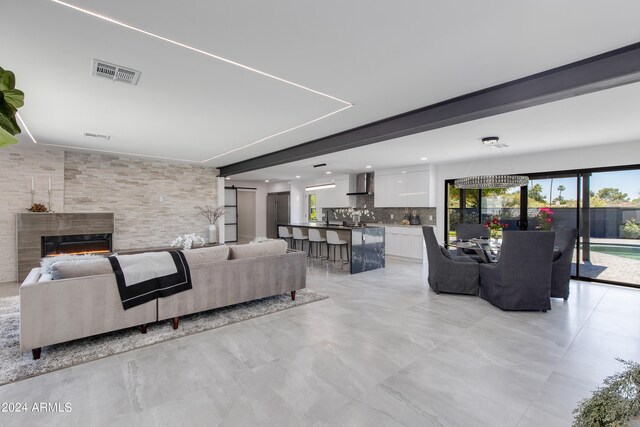 living room featuring light tile floors