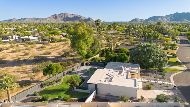 birds eye view of property featuring a mountain view