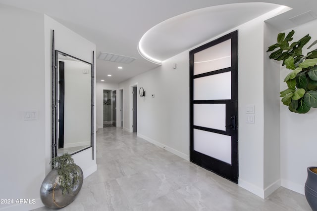 interior space featuring light tile flooring