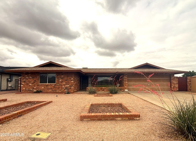 4537 E Emelita Ave, Mesa, AZ 85206 - ranch-style home featuring an attached garage, brick siding, and driveway