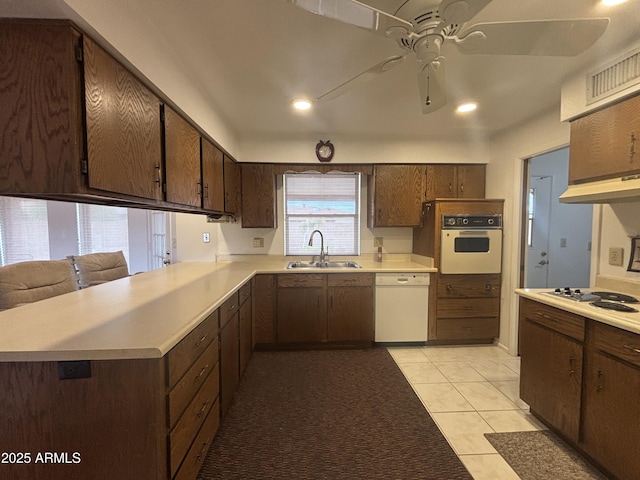 4537 E Emelita Ave, Mesa, AZ 85206 - kitchen with a sink, white appliances, under cabinet range hood, ceiling fan, and light countertops