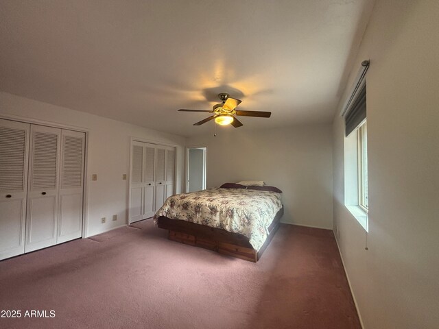 4537 E Emelita Ave, Mesa, AZ 85206 - carpeted bedroom featuring a ceiling fan and two closets
