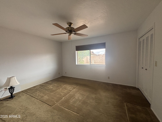 4537 E Emelita Ave, Mesa, AZ 85206 - unfurnished bedroom featuring ceiling fan, carpet, a closet, and baseboards