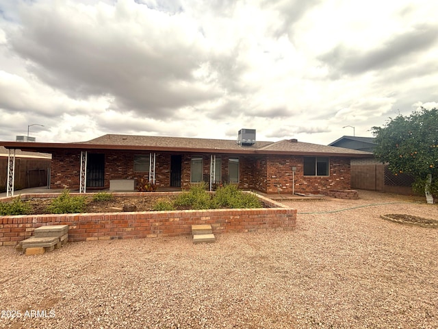 4537 E Emelita Ave, Mesa, AZ 85206 - back of property with fence, cooling unit, and brick siding