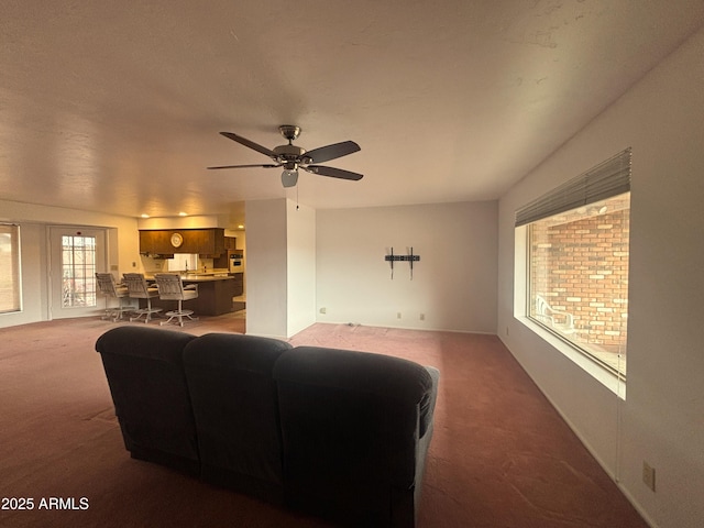4537 E Emelita Ave, Mesa, AZ 85206 - living room with a ceiling fan and carpet floors