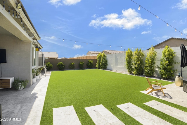 17976 W Ashley Dr, Goodyear, AZ 85338 - fenced backyard with a patio