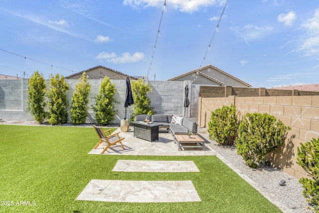 17976 W Ashley Dr, Goodyear, AZ 85338 - fenced backyard with outdoor lounge area and a patio area
