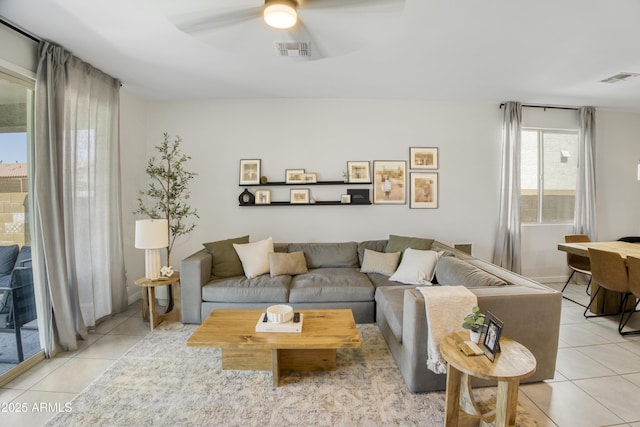 17976 W Ashley Dr, Goodyear, AZ 85338 - living area featuring light tile patterned floors and ceiling fan