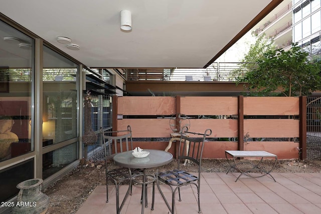 view of patio with fence