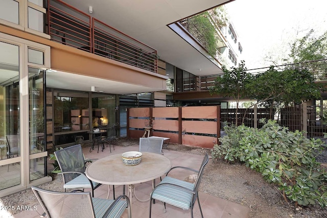 view of patio / terrace with fence and outdoor dining area