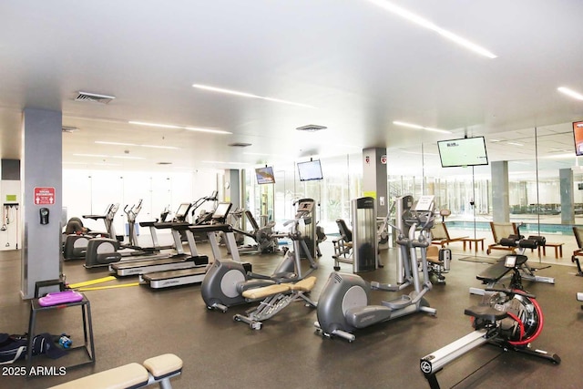 exercise room featuring visible vents