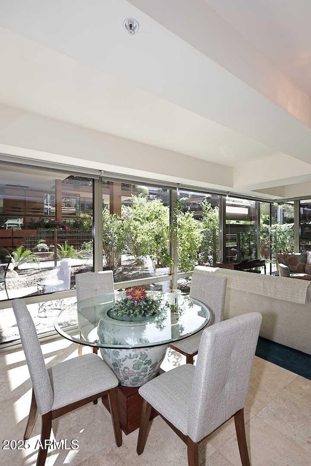 dining area featuring tile patterned flooring