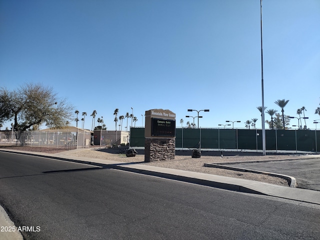 view of road featuring sidewalks and curbs