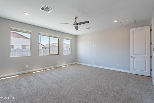 carpeted spare room with baseboards, ceiling fan, and recessed lighting