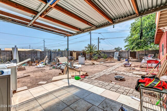 view of patio featuring a fire pit