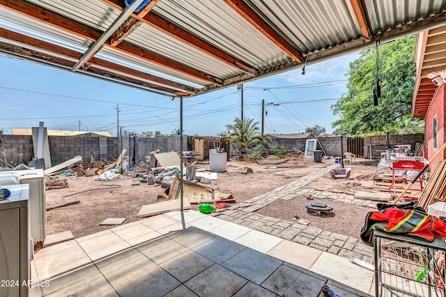 view of patio featuring an outdoor fire pit