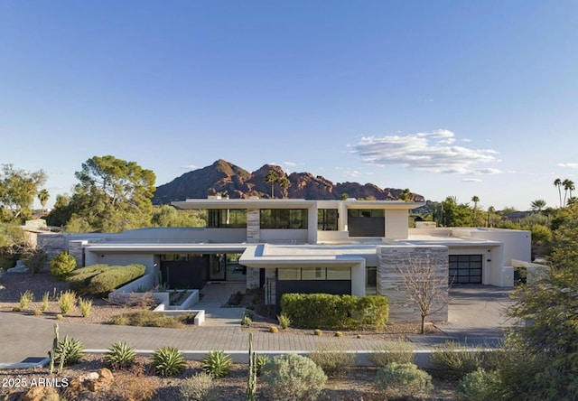 view of front facade featuring a mountain view