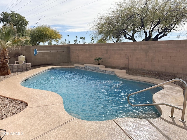 view of swimming pool featuring a fenced in pool and a fenced backyard