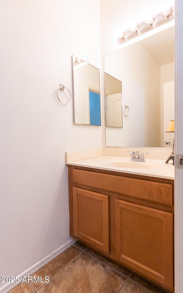 bathroom featuring vanity and tile patterned floors